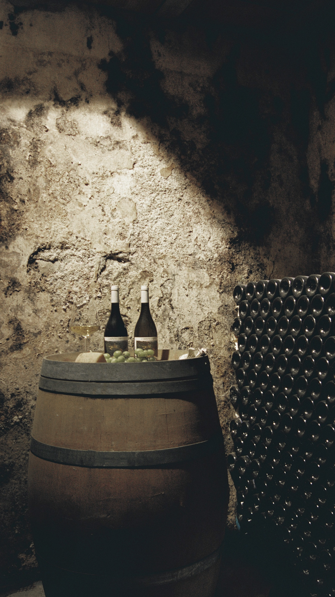 Barrel and bottles in the Clos Alkio cellar